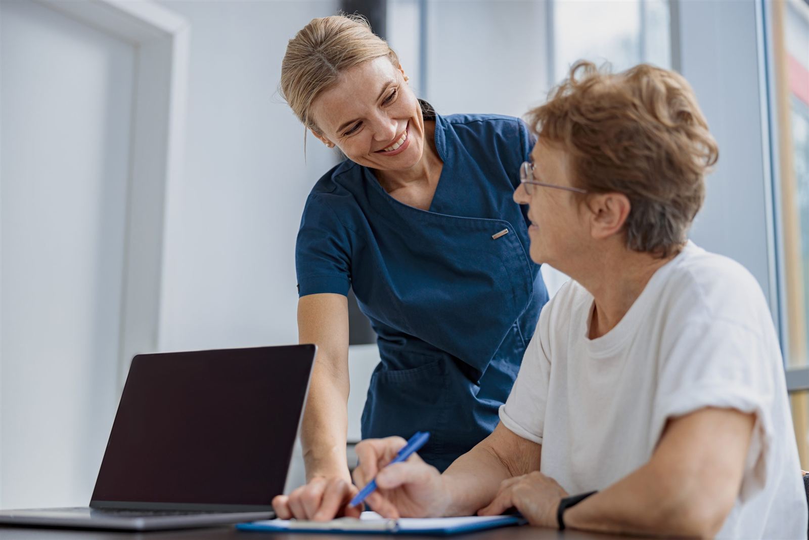 Patient filling in insurance eligibility document